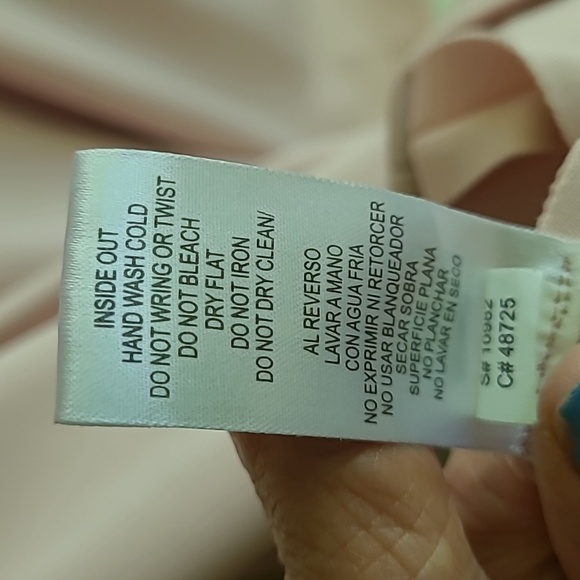 Dusty rose poly spandex  creates a lovely designer dress. I wish it fit me! - Picture 8 of 12